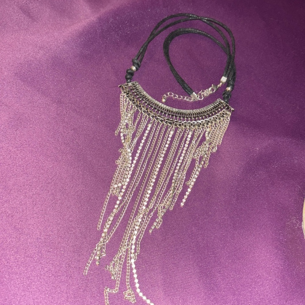 Chain diamond looking necklace around a leather chain